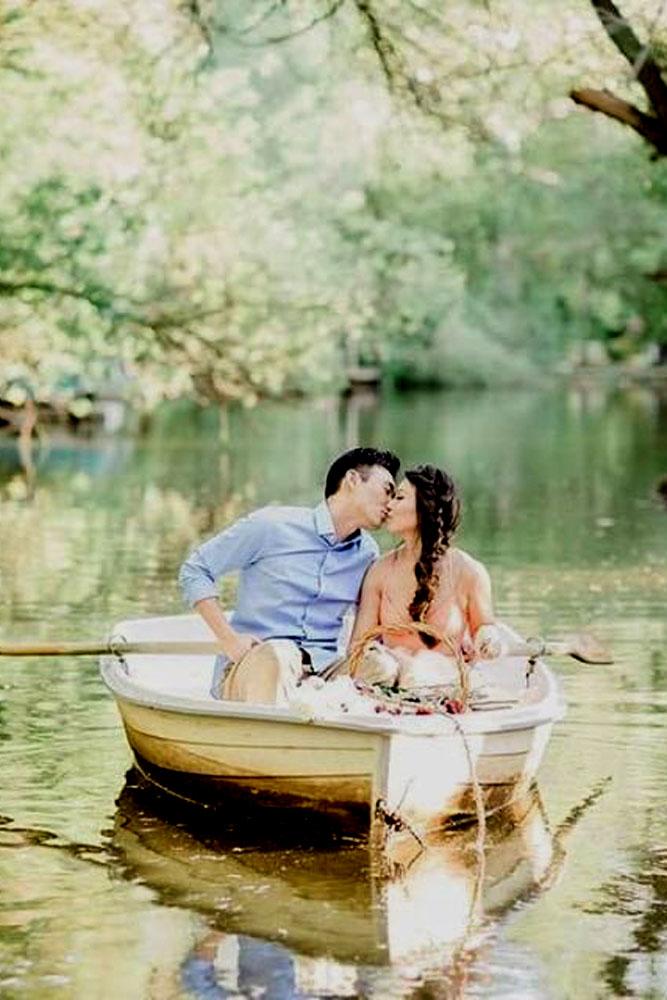 proposal in a park sweet couple in boat