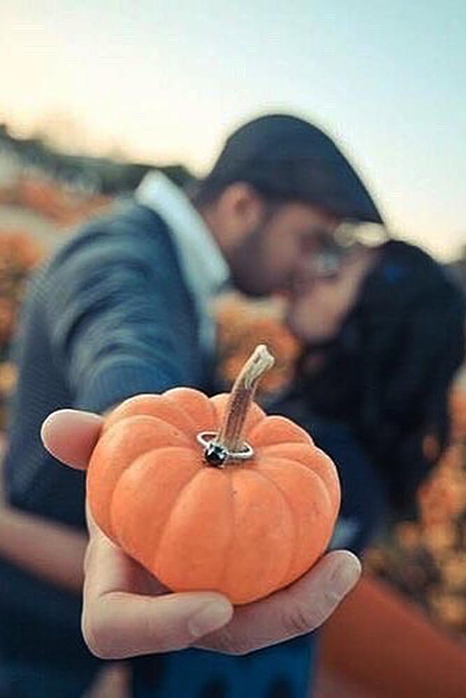 romantic ways to propose couple kiss engaged pumpkin