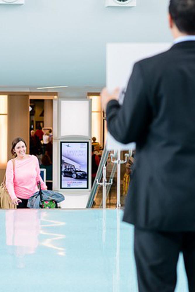 romantic ways to propose surprise airport proposal