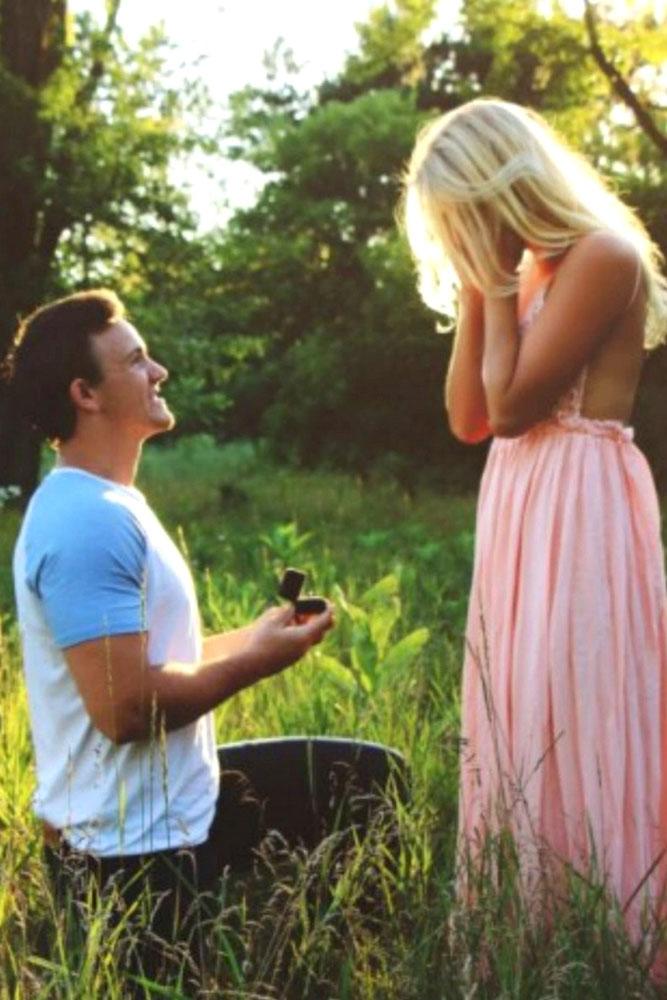 wedding proposal ideas in a park couple in forest engagement