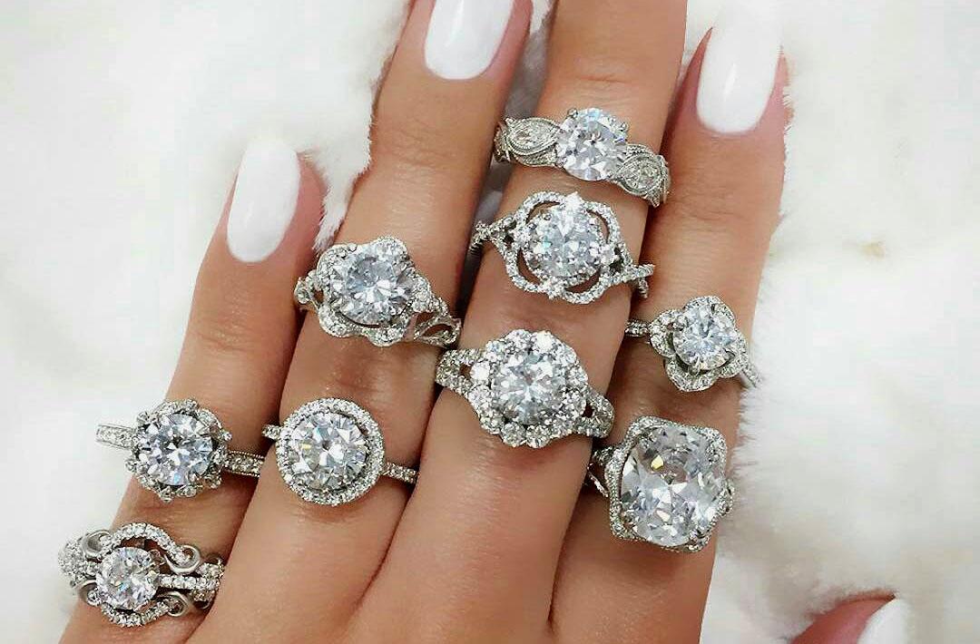 diamond-engagement-rings-on-fingers-in-white-gold-@diamondmansion-1.jpg