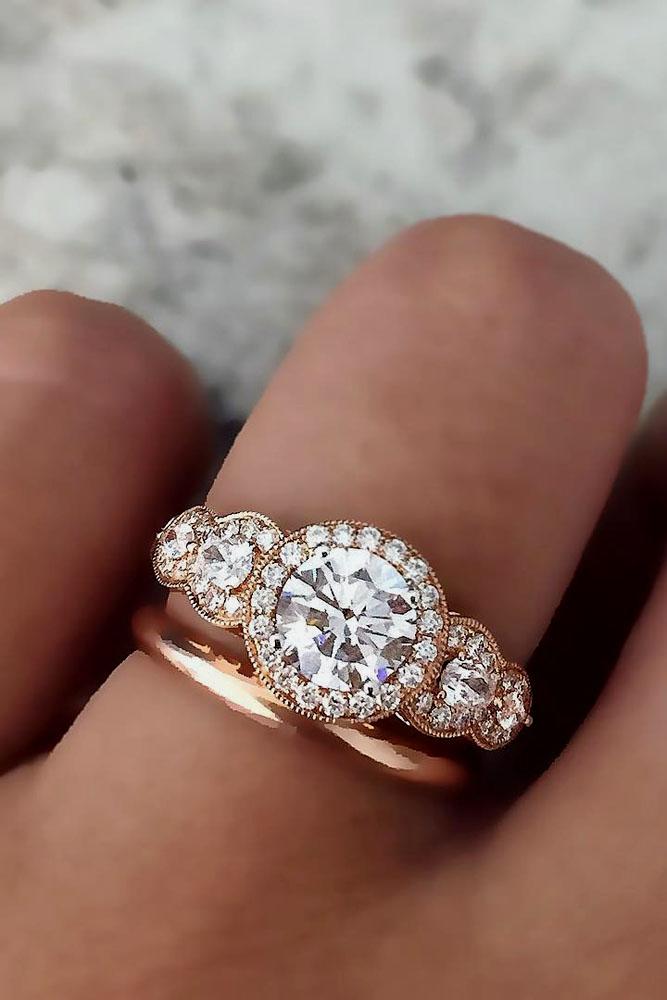 rose gold engagement rings three stones halo
