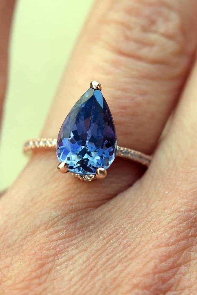 sapphire engagement rings pear cut sapphire pave band diamonds