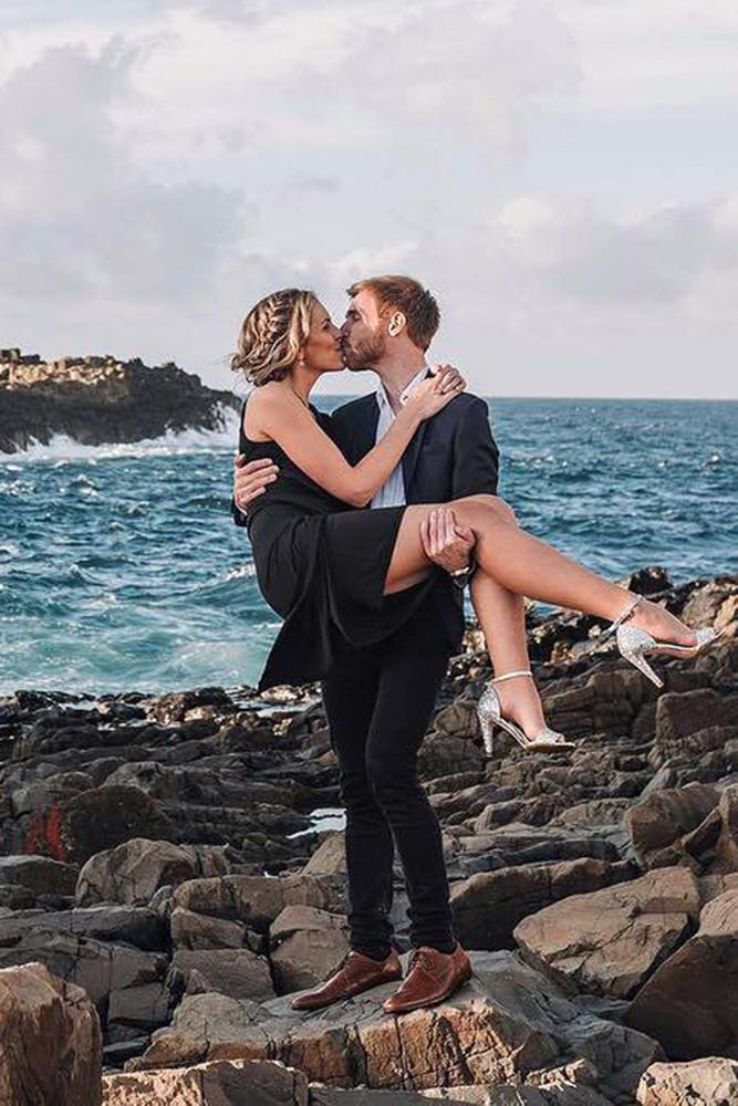 summer proposal ideas pair in costumes on a stony bank