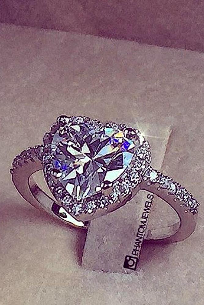 unique engagement rings center hearth pave band