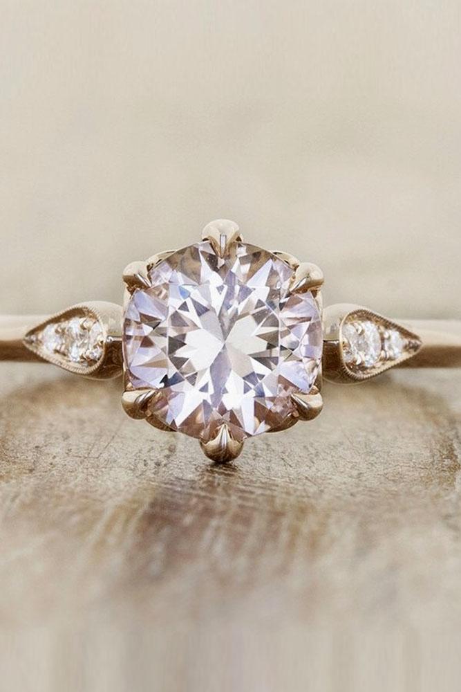 vintage engagement rings in rose gold with round diamond