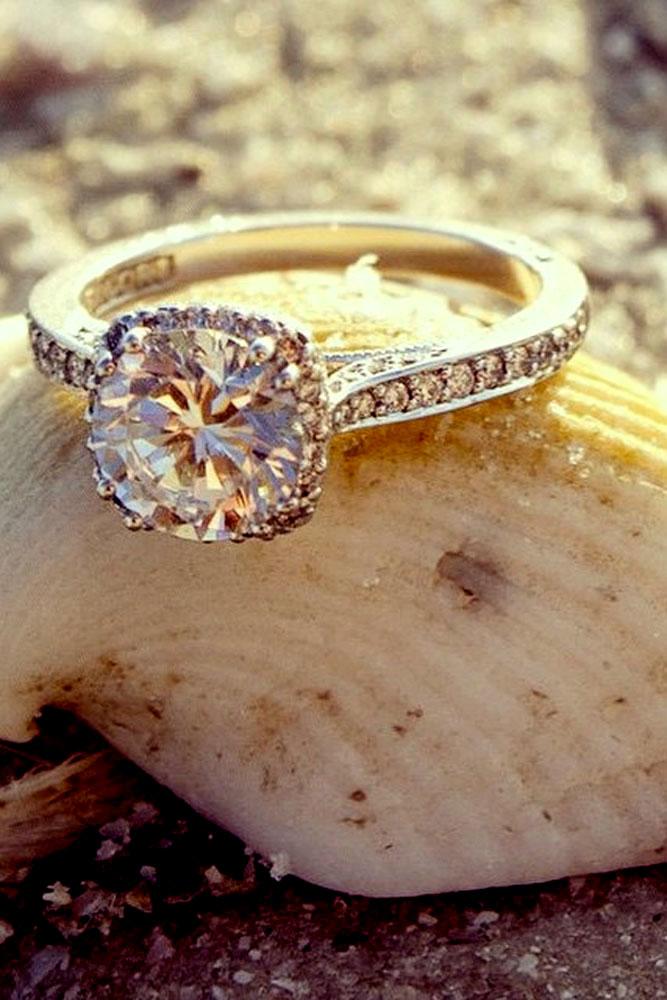 vintage engagement rings in white and rose gold with center round diamond