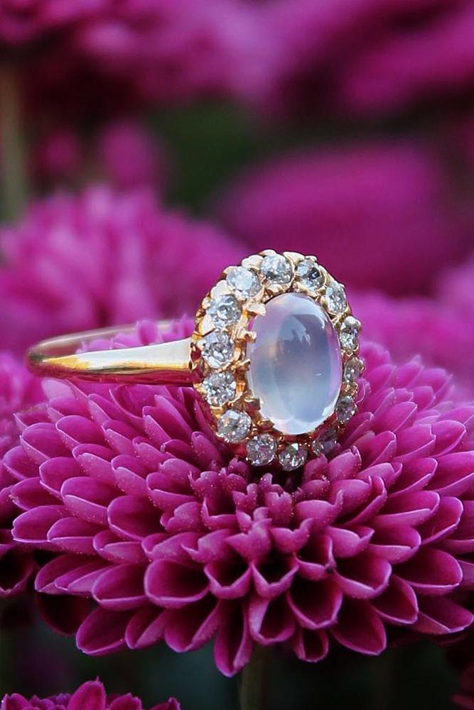 vintage engagement rings oval cut floral halo rose gold