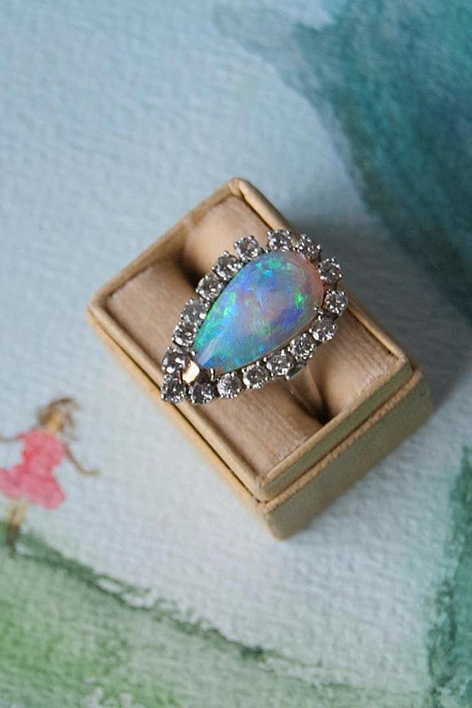 vintage engagement rings pear cut opal halo floral gold