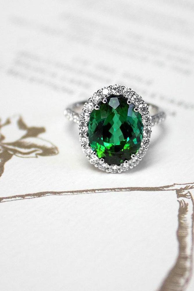 colored engagement rings diamond halo oval green gemstone white gold