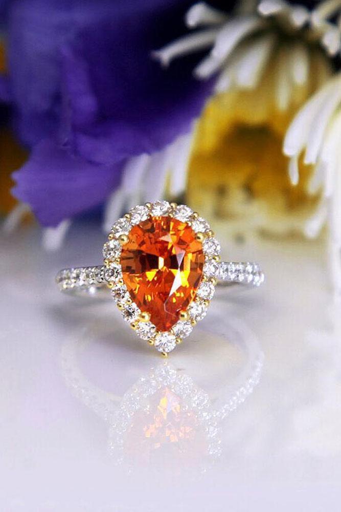 colored engagement rings pear shaped center gems in diamond halo white gold
