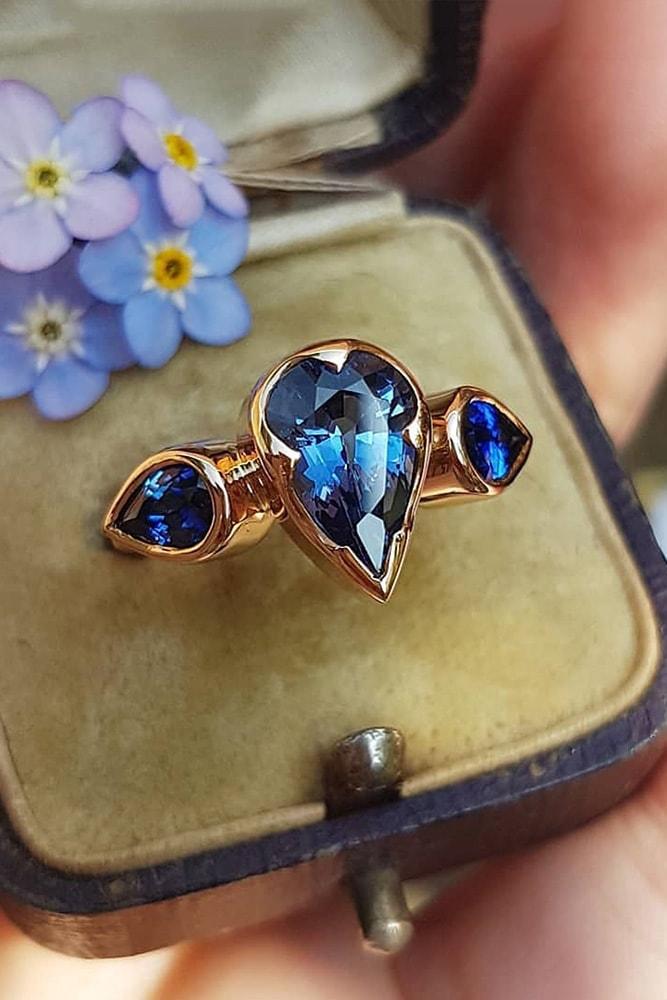 colored engagement rings rose gold pear cut blue sapphires three stones pave band simple
