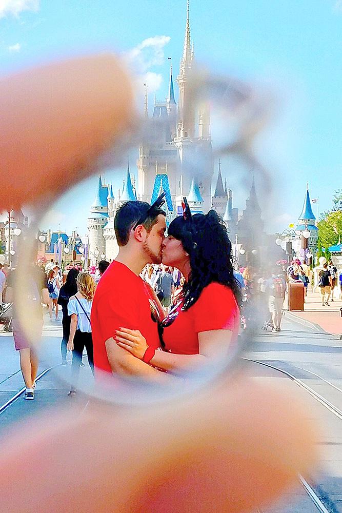disney proposals couple kiss ring