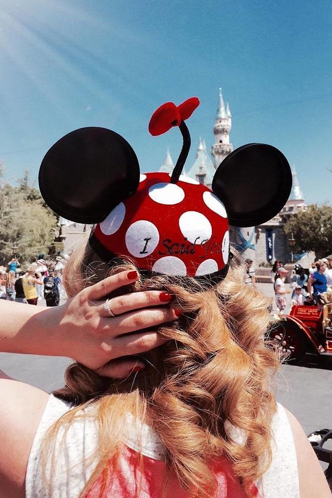 Disney proposals mini mouse hat on the girl with engagement rings
