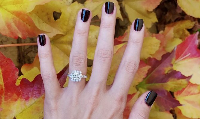 fall proposal ideas hand with engagement ring