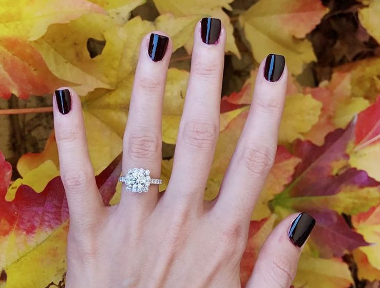 fall proposal ideas hand with engagement ring