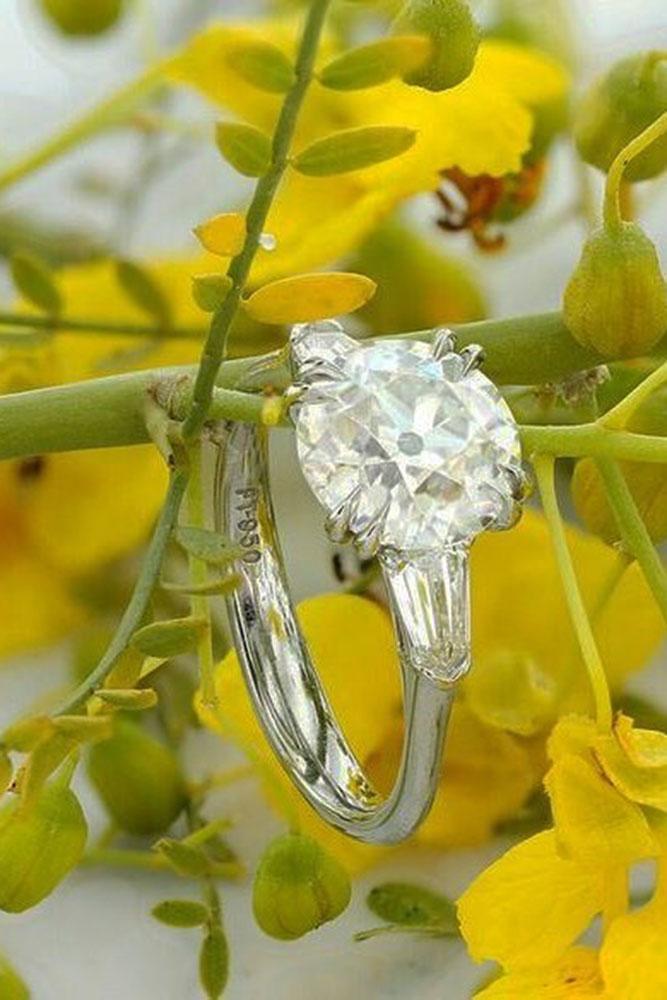 round engagement rings white gold three stones diamond