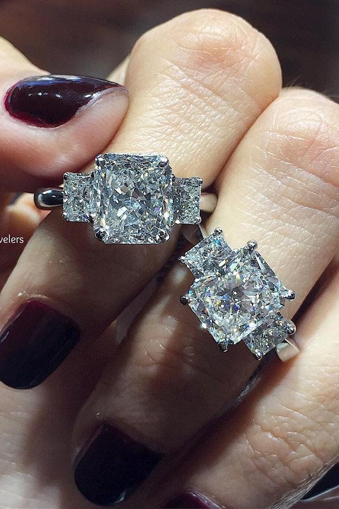 three stones engagement rings diamond emerald cut white gold
