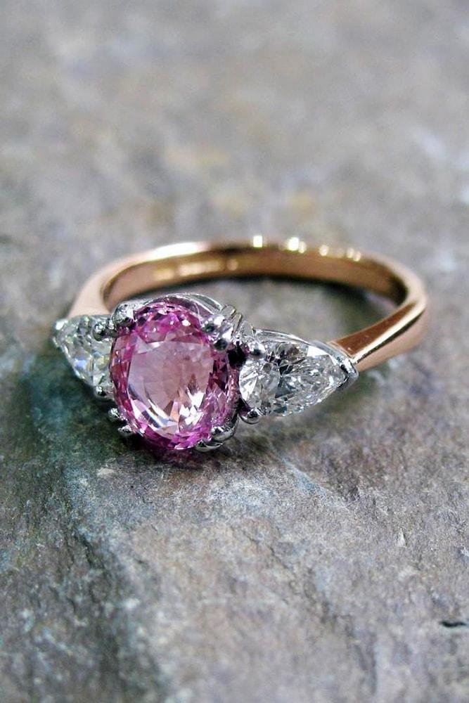 three stones engagement rings rose gold pink sapphire with pear shaped diamonds on either side
