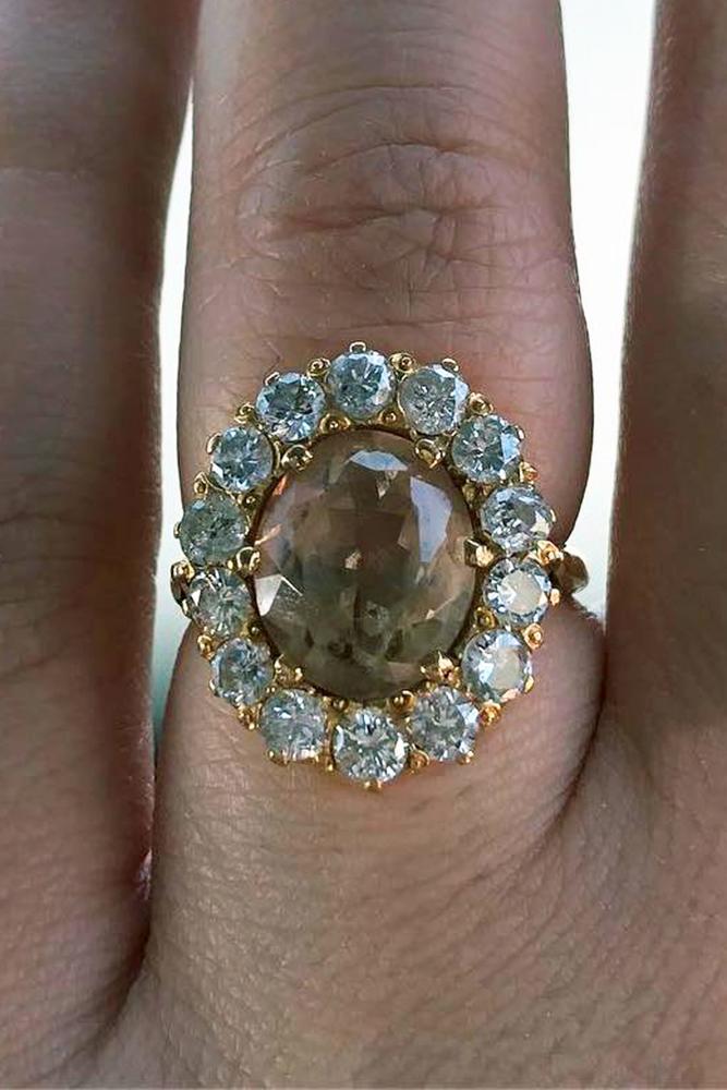 gemstone engagement rings oval cut halo topaz