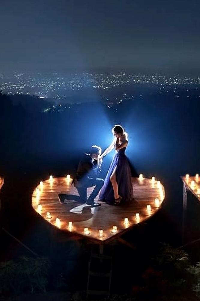 marriage proposal romantic ideas at the roof candle