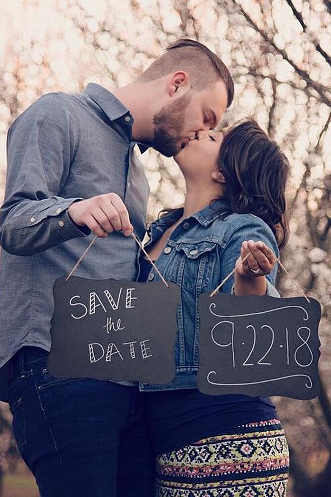 save the date ideas engaged couple kiss nature
