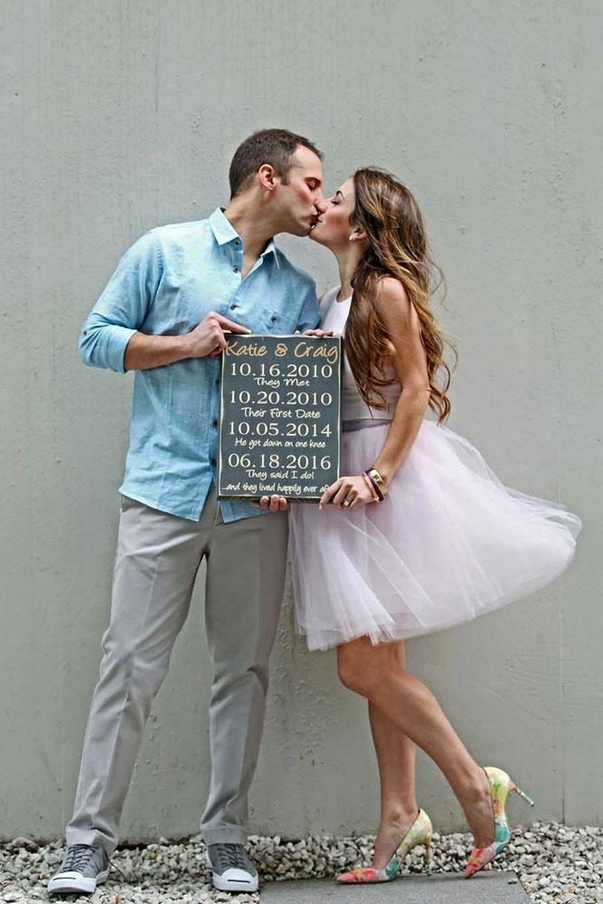 save the date ideas kissing sweet couple takes the sign