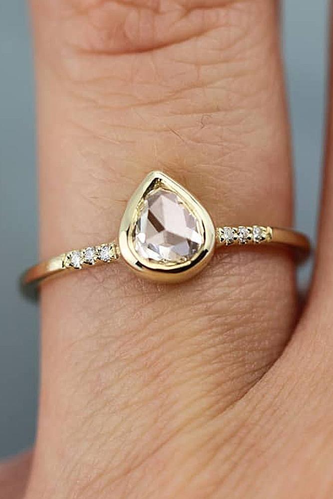 yellow gold engagement rings pear cut solitaire