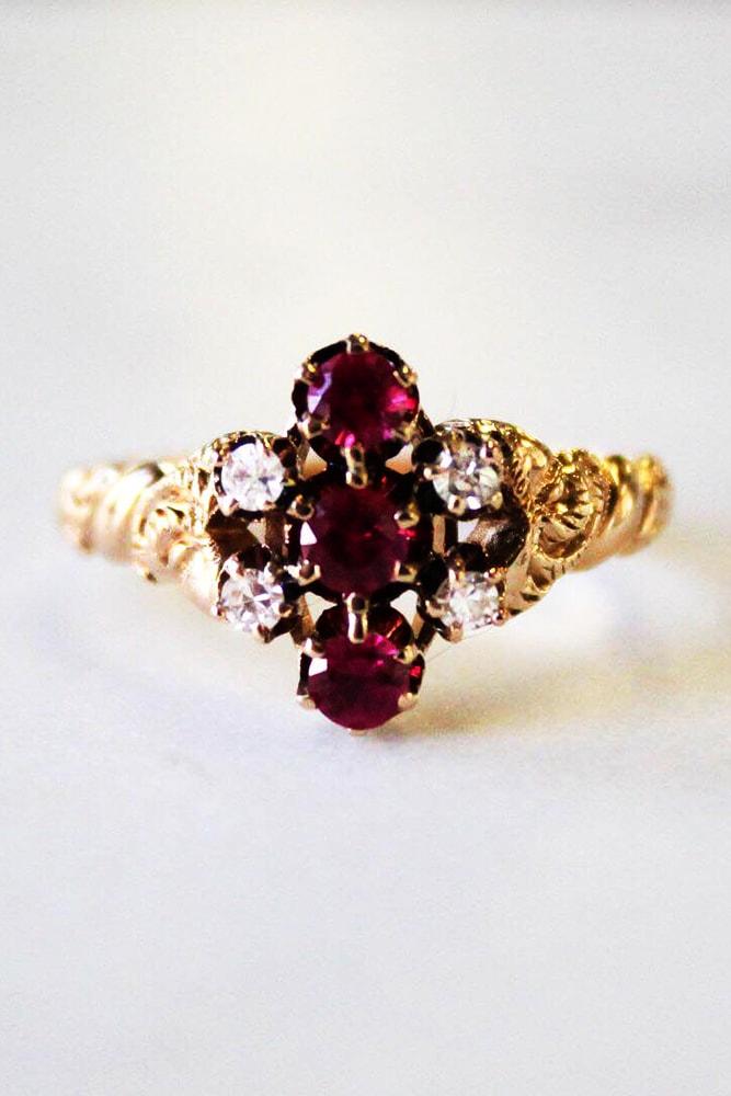 yellow gold engagement rings unique design three round cut gemstones in the centre unique pave band
