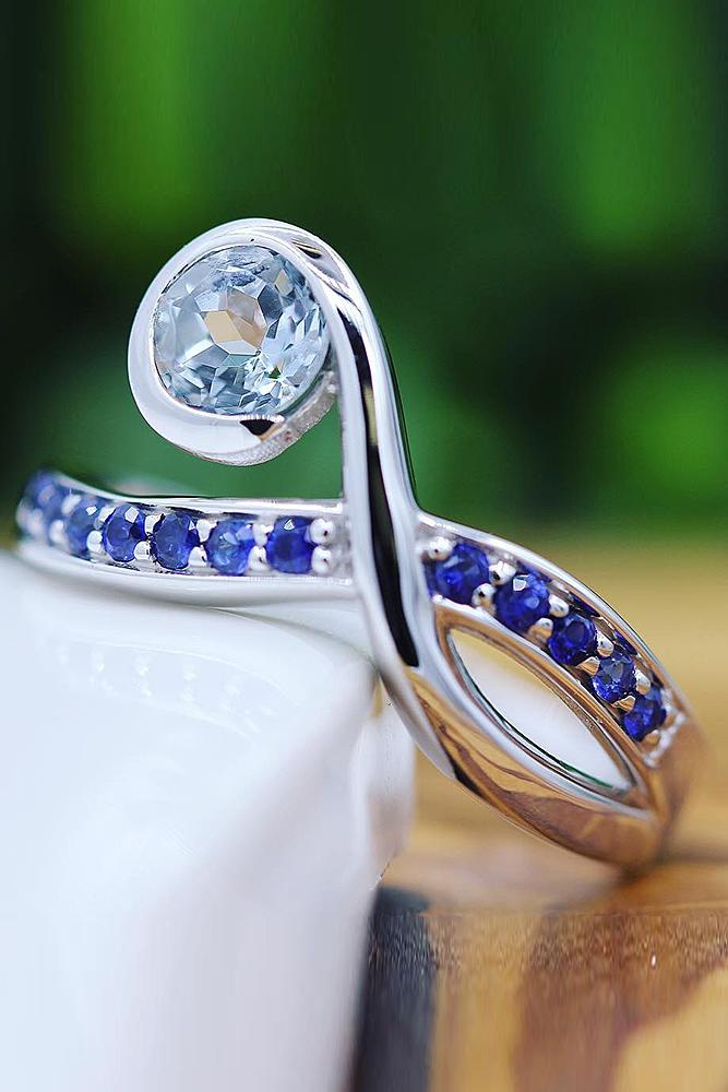 aquamarine engagement rings white gold modern design sapphires and round cut aquamarine