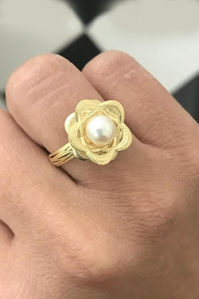 beautiful engagement rings with floral elements yellow gold round cut pearl