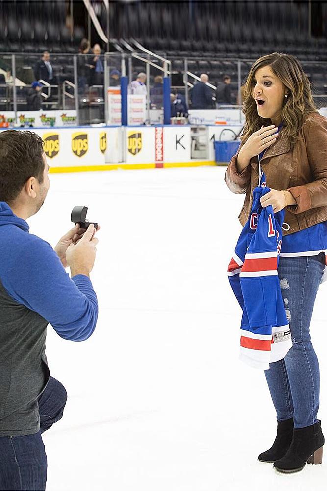 best proposal ideas man engage the woman during the sport game