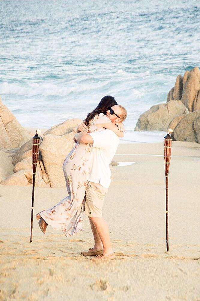 engagement photos beach couple sea
