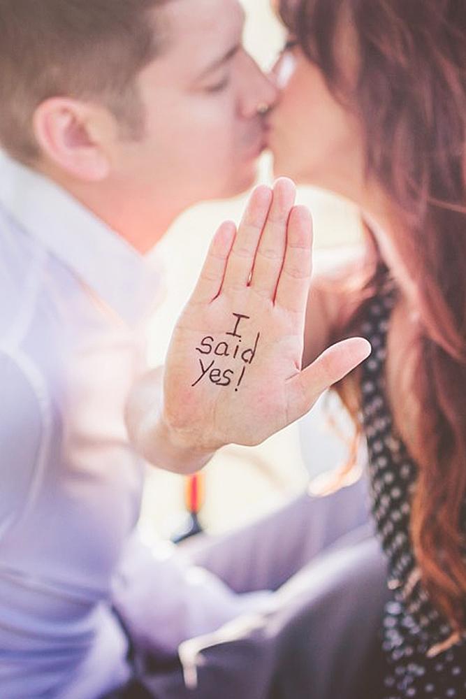 engagement photos couple kiss engaged said yes