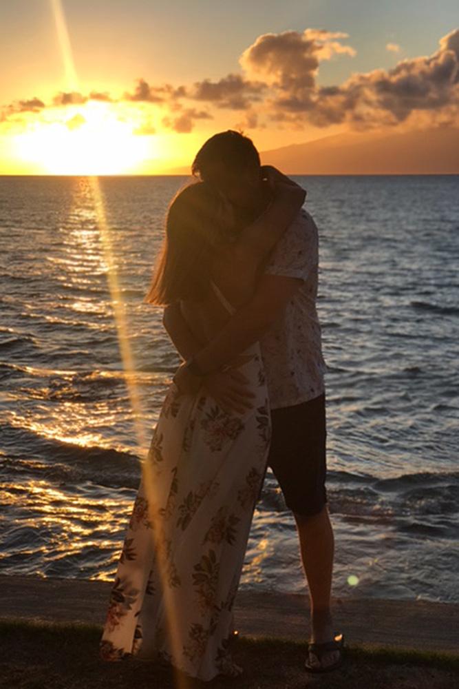 engagement photos couple on the beach sunset