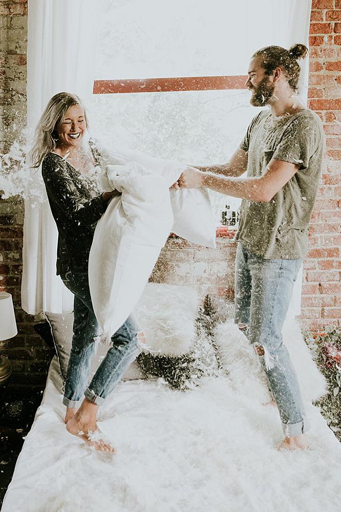 engagement photos couple pillow fight romantic cute