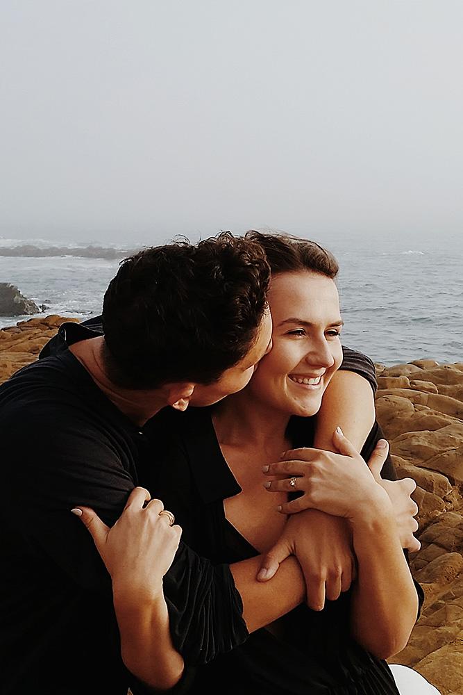 engagement photos man and woman happy couple on the beach