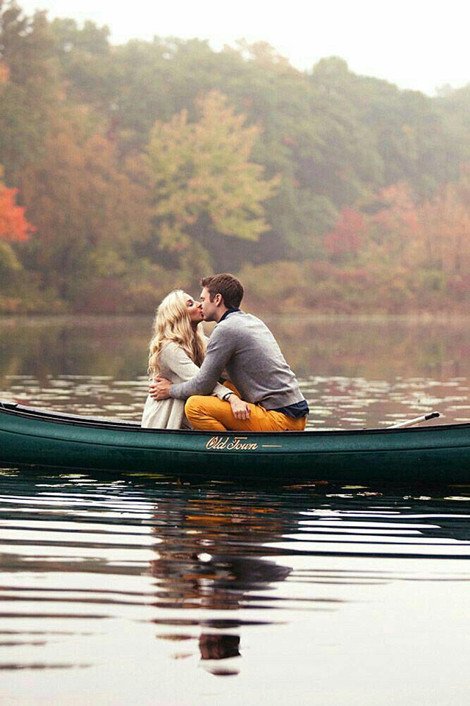 engagement photos man and woman on the boat romantic