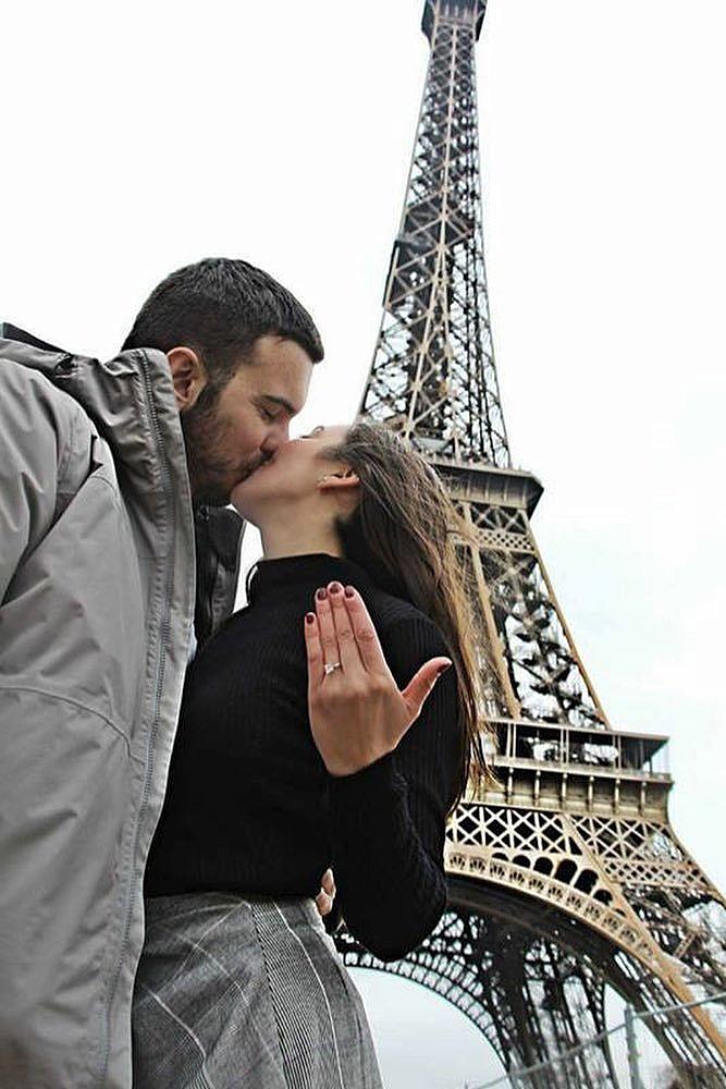 engagement photos proposal kiss ring on her finger in paris