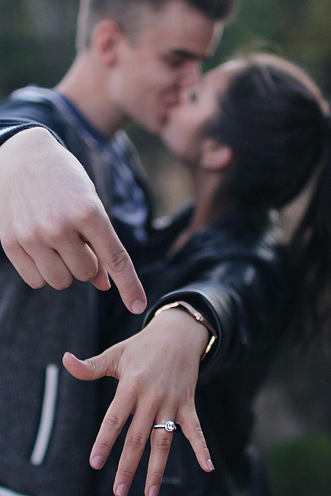 engagement photos proposal kiss ring on the finger