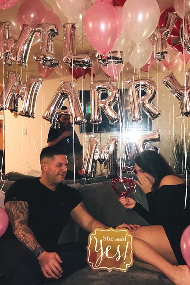 engagement pictures brightful decoration with ballons for two man and woman