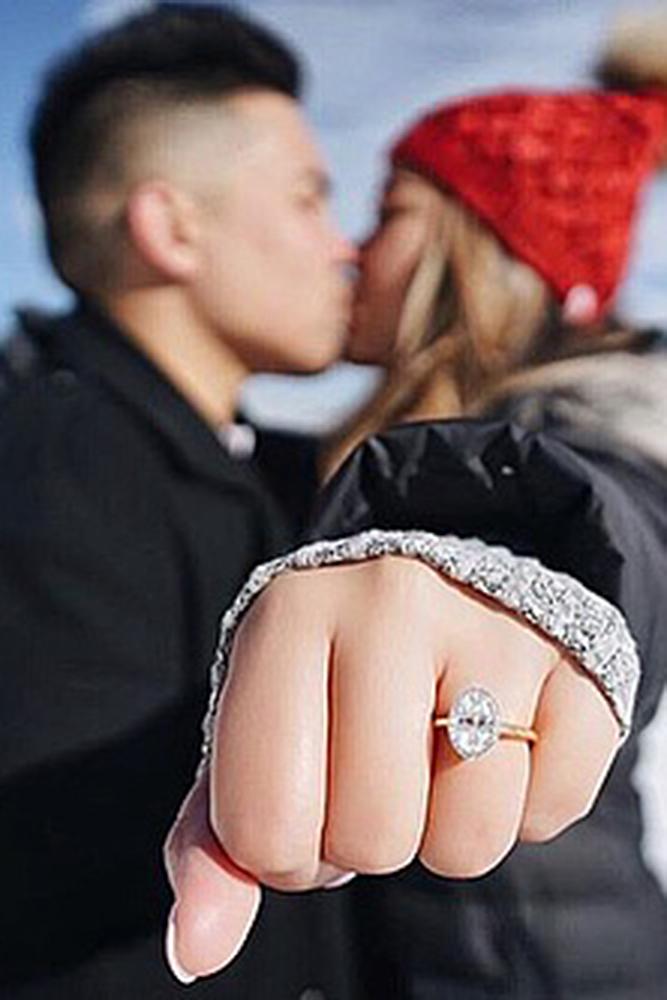 engagement pictures couple engaged kiss ring