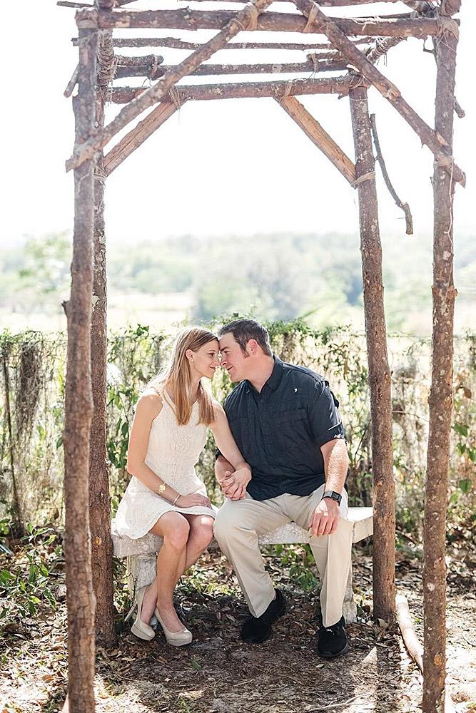 engagement pictures man and woman engaged kiss