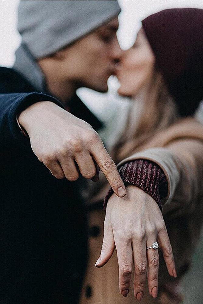 engagement pictures showing ring kiss engaged man and woman