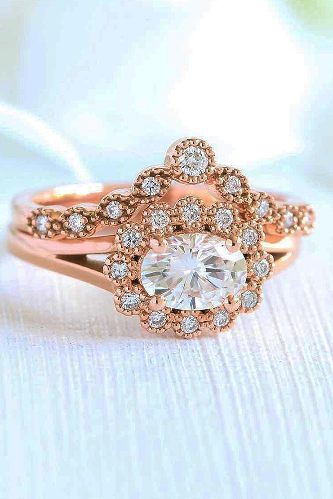 vintage wedding rings oval cut diamond floral halo