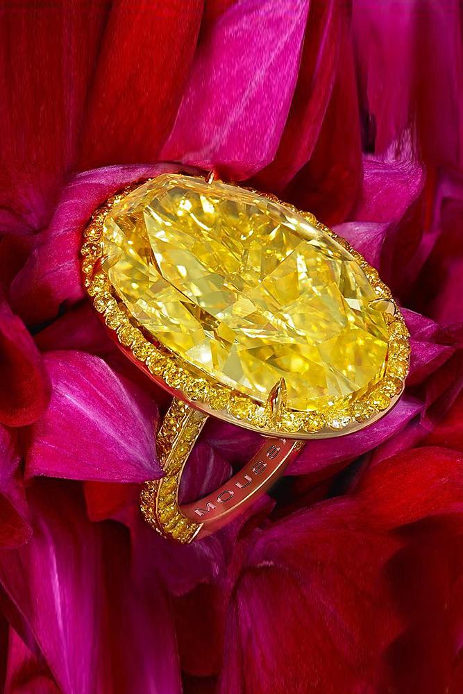 yellow diamond engagement rings oval cut halo pave band