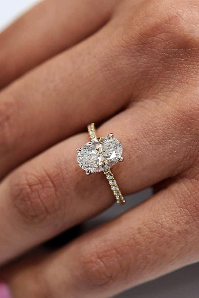 classic engagement rings stunning oval cut diamond in yellow gold pave band classic