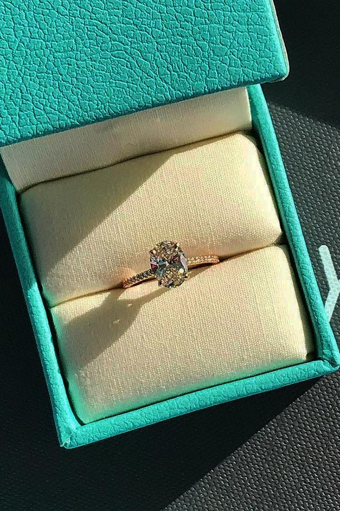 classic engagement rings stunning oval cut diamond in yellow gold pave band classic sparkling