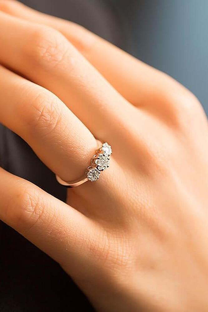 classic engagement rings three stones rose gold
