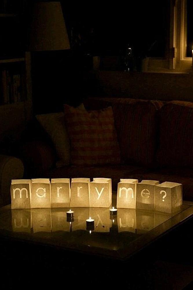 creative proposal ideas candles lightning romantic
